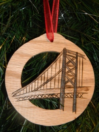 Ben Franklin Bridge, $15. Four inch circle on oak. Can be personalized with any phrase around the circle. Examples: Baby's first Christmas, Williams Family 20th Christmas, etc.