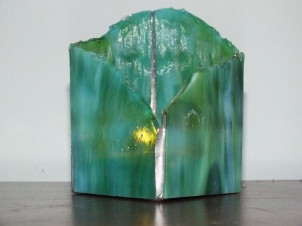 Green swirl glass, one candle. $8.50